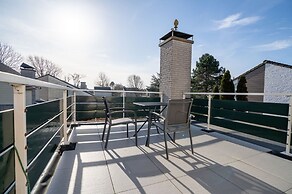 Holiday Home in the Middle of the Green North Sea Park Near the Beach 
