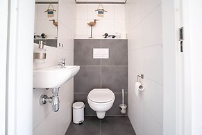 Holiday Home in the Middle of the Green North Sea Park Near the Beach 