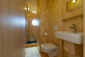 Tiny Wrap-around House on the Edge of Beach