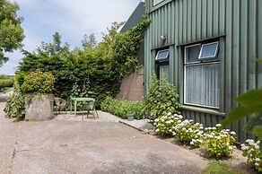 Tiny Wrap-around House on the Edge of Beach