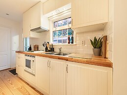 Chalet Kieftveen With hot tub for Four Person