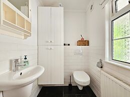 Chalet Kieftveen With hot tub for Four Person