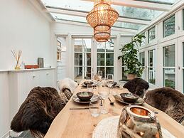 Chalet Kieftveen With hot tub for Four Person