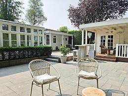 Chalet Kieftveen With hot tub for Four Person