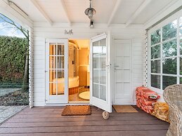 Chalet Kieftveen With hot tub for Four Person