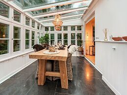 Chalet Kieftveen With hot tub for Four Person