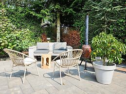 Chalet Kieftveen With hot tub for Four Person