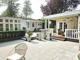 Chalet Kieftveen With hot tub for Four Person