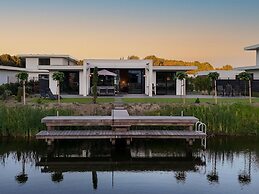 Luxury Villa With Veranda Screen Sups and Canoe