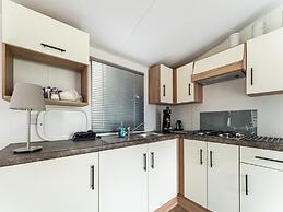 Relaxing Holiday Chalet by the Water in Grou