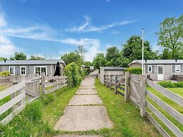 Relaxing Holiday Chalet by the Water in Grou