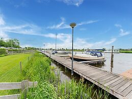 Relaxing Holiday Chalet by the Water in Grou