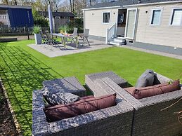 Relaxing Holiday Chalet by the Water in Grou