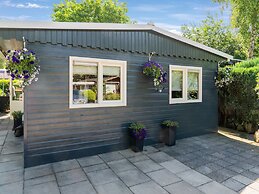 Lovely Wooden Chalet With Garden in Reutum