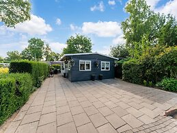 Lovely Wooden Chalet With Garden in Reutum