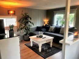 Lovely Wooden Chalet With Garden in Reutum
