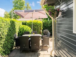 Lovely Wooden Chalet With Garden in Reutum