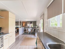 Lovely Wooden Chalet With Garden in Reutum