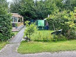 Lovely Chalet in De Pol With Garden