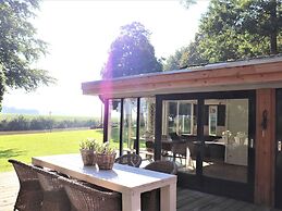 Fantastic Chalet Near Open Waterways, hot tub
