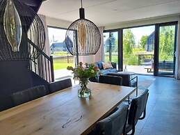 Water Villa in Balk With Lake Access