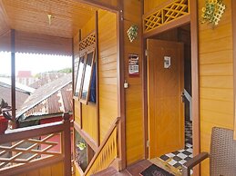 OYO 91246 Pulisan Ekowisata Homestay Near Wisata Pantai Desa Pulisan (