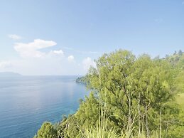 OYO 91246 Pulisan Ekowisata Homestay Near Wisata Pantai Desa Pulisan (