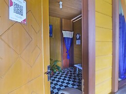 OYO 91246 Pulisan Ekowisata Homestay Near Wisata Pantai Desa Pulisan (