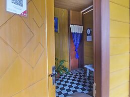 OYO 91246 Pulisan Ekowisata Homestay Near Wisata Pantai Desa Pulisan (