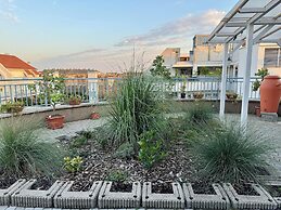 Rooftop City Residence