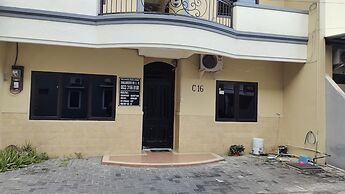 OYO 90870 C16 Siwalankerto Syariah