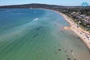 Logooner ocean house walking to beach