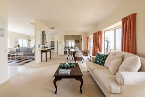 Logooner ocean house walking to beach