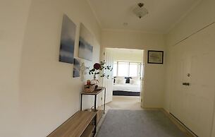 Logooner ocean house walking to beach