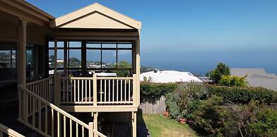 Logooner ocean house walking to beach