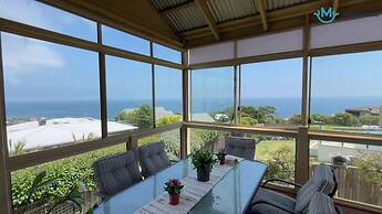 Logooner ocean house walking to beach