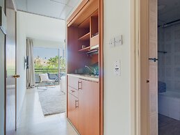 Studio Apartment With Balcony and Garden View