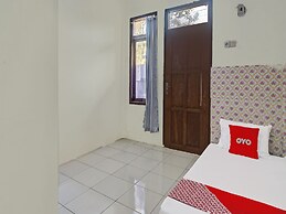 SPOT ON 91799 Sosonopan Homestay Near LANTAMAL VIII MANADO