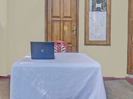 SPOT ON 91799 Sosonopan Homestay Near LANTAMAL VIII MANADO