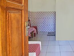 SPOT ON 91799 Sosonopan Homestay Near LANTAMAL VIII MANADO