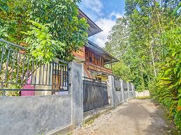 SPOT ON 91799 Sosonopan Homestay Near LANTAMAL VIII MANADO