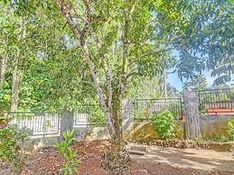 SPOT ON 91799 Sosonopan Homestay Near LANTAMAL VIII MANADO