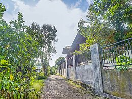 SPOT ON 91799 Sosonopan Homestay Near LANTAMAL VIII MANADO