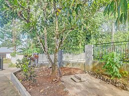 SPOT ON 91799 Sosonopan Homestay Near LANTAMAL VIII MANADO