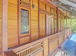 SPOT ON 91799 Sosonopan Homestay Near LANTAMAL VIII MANADO