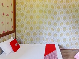 SPOT ON 91799 Sosonopan Homestay Near LANTAMAL VIII MANADO