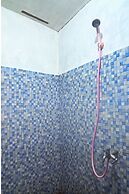 SPOT ON 91799 Sosonopan Homestay Near LANTAMAL VIII MANADO