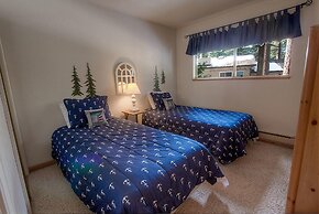 Whispering Wood 3 Bedroom Home by RedAwning