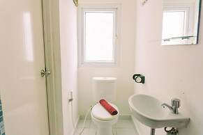 Homey And Tidy Studio Room Aeropolis Apartment