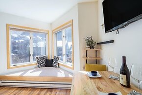 Modern Comfort River/mtn Views + Hot Tub 1 Bedroom Condo by RedAwning